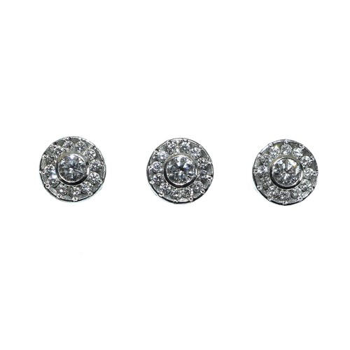 414 - A pair of gentleman's 18ct white gold and diamond cufflinks, together with three matching shirt stud... 