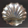A George V silver shell form dish, engraved with the initial 'M', Atkin Brothers, Sheffield 1911, 22... 
