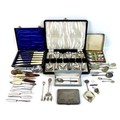 A small group of silver and plated items, including an Edwardian silver cigarette case, two pickle f... 