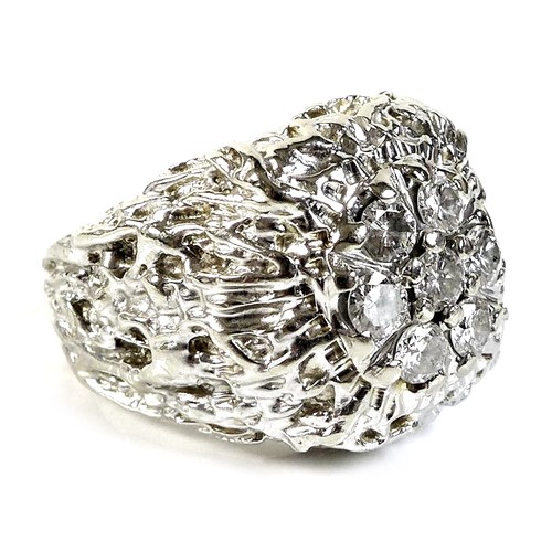 412 - An American 14K white gold over yellow gold diamond cluster ring, of unusual modernist design, circa... 