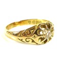A 18ct yellow gold and diamond solitaire gentleman's gypsy ring, Victorian / Edward VII, with scroll... 