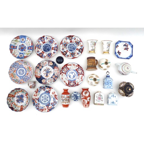 20 - A large group of English, European, Chinese and Japanese ceramics, including seven Japanese Imari pl... 