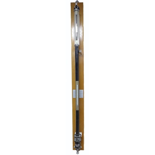 300 - A modern stick barometer, with thermometer, on a mahogany backboard, 8.5 by 8 by 105cm high.