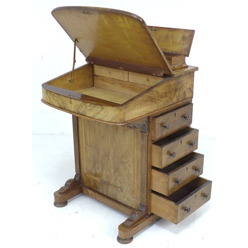 304 - A late Victorian walnut Davenport, with marquetry inlaid top, a leather inset to its writing slope, ... 