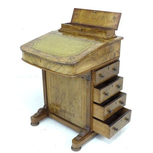 304 - A late Victorian walnut Davenport, with marquetry inlaid top, a leather inset to its writing slope, ... 