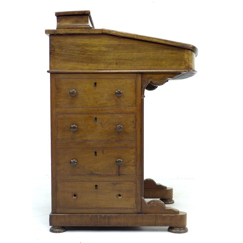 304 - A late Victorian walnut Davenport, with marquetry inlaid top, a leather inset to its writing slope, ... 