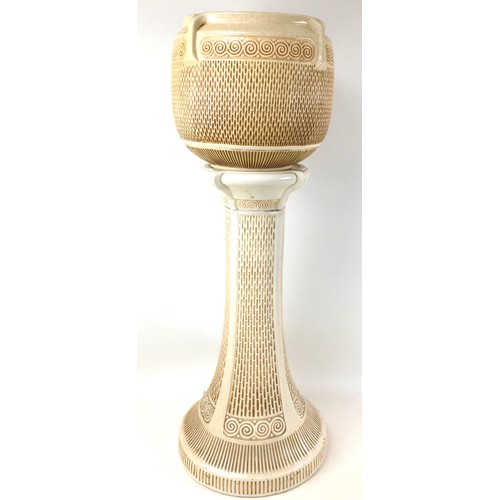 60 - A Victorian Bretby cream coloured jardiniere on stand, with impressed marks to base of both pieces, ... 