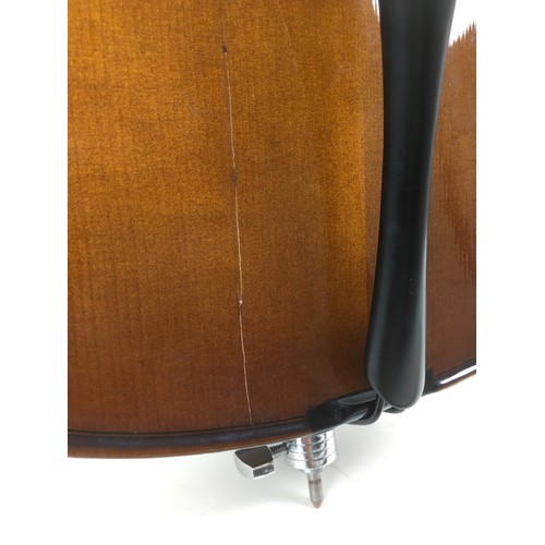 130 - A Stentor half size cello, together with bow and soft case.