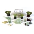 A collection of modern jade and hardstone ornaments, including two pairs of cups, and various carved... 