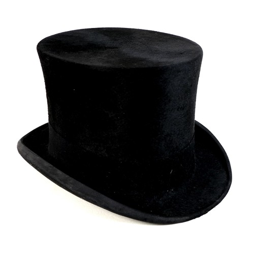 124 - A Lock & Co silk top hat, size approximately 7 1/4, internally, 20.5cm (8”) front to back, 16.5cm (6... 