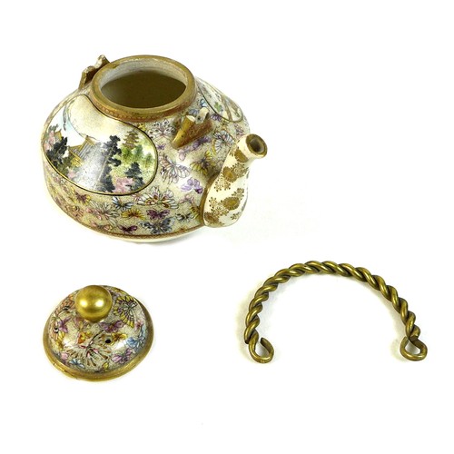 9 - A fine Japanese Satsuma pottery teapot, Meiji period, with gilt metal swing handle, finely painted i... 