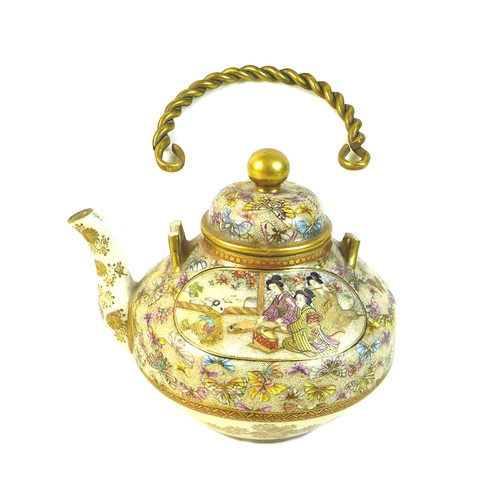 9 - A fine Japanese Satsuma pottery teapot, Meiji period, with gilt metal swing handle, finely painted i... 