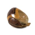 A Japanese Katabori netsuke, likely Meiji period, made out of a tagua nut and shell and carved in th... 