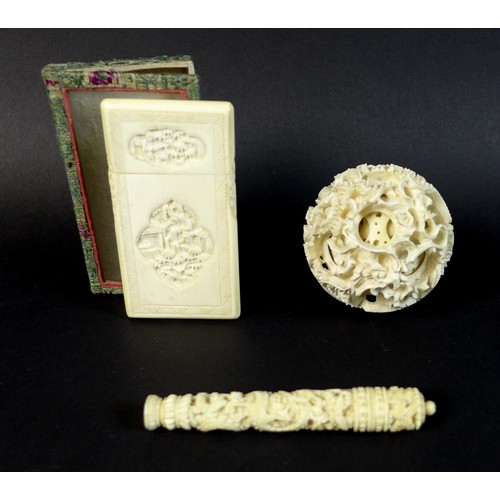 10 - A group of three late 19th / early 20th century Chinese ivory items comprising a card case, the cent... 