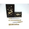 A reproduction Japanese sword or wakizashi in ornately carved bone saya, with matching tsuka, with b... 