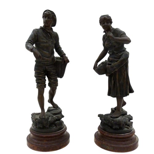 123 - A pair of French bronzed spelter figures, depicting Pecheur au Filet and Pecheuse au Filet, after Do... 