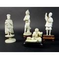 A group of four late 19th /early 20th century ivory figures, comprising an okimono of a fisherman on... 