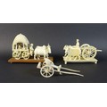 Two 19th century Indian ivory carvings, one of a howdah with two occupants being pulled by a pair of... 