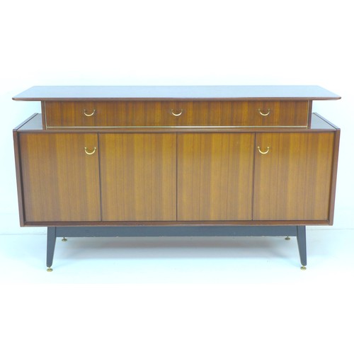 296 - A retro G-Plan E. Gomme sideboard, circa 1958, tola and black sideboard, model T914, with three draw... 