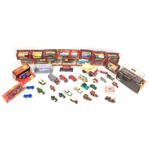 146 - A collection of Corgi, Dinky and sixteen boxed Matchbox models of Yesteryear die cast models, includ... 