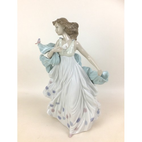 42 - A Lladro porcelain figurine 'Summer Serenade', model no. 6193, designed by Regino Torrijos, with ori... 