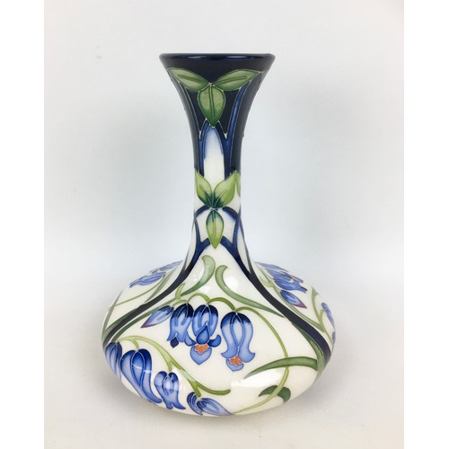 24 - A Moorcroft pottery Otley Chevin Bluebell pattern bottle vase, with impressed marks to base, by Rach... 