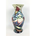 A Moorcroft pottery vase in slipper orchid pattern, of baluster form, with impressed marks, dated 20... 