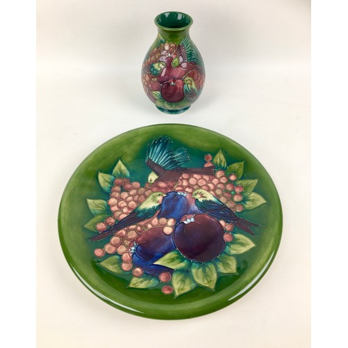 32 - Two pieces Moorcroft pottery with finch and berry design by Sally Tuffin on green ground, comprising... 
