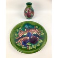 Two pieces Moorcroft pottery with finch and berry design by Sally Tuffin on green ground, comprising... 