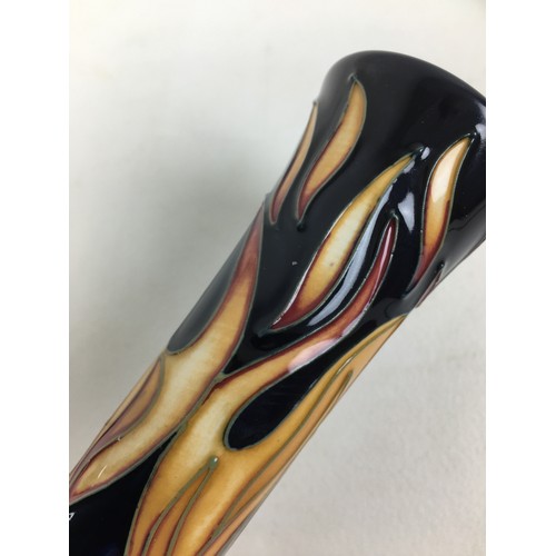 35 - A Moorcroft pottery “Flames of the Phoenix” bottle vase, with impressed marks to base and signed by ... 