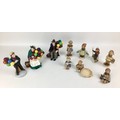 A collection of Royal Doulton and Hummel figurines, comprising, three Royal Doulton figurines, 'The ... 
