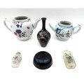 A group of six Oriental wares, including a European tea pot decorated in the Chinese style, 22 by 12... 
