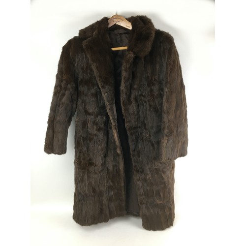 126 - A group of seven vintage fur jackets and coats, including a deep brown soft fur, knee length coat, w... 