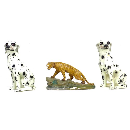 77 - A pair of modern Italian ceramic figures, modelled as seated Dalmations, each 33 by 27 by 42cm high,... 