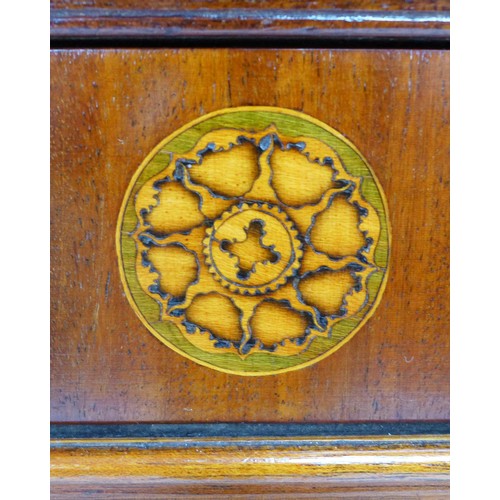 301 - A George III mahogany chest of drawers, crossbanded frieze inlaid with three marquetry roundels over... 