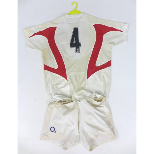 129 - A 2005 England Rugby Team shirt, signed in black marker 'To Harry, All The Best, Martin Johnson', an... 