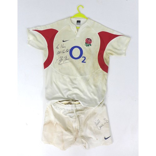 129 - A 2005 England Rugby Team shirt, signed in black marker 'To Harry, All The Best, Martin Johnson', an... 