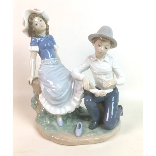 43 - Five Nao by Lladro porcelain figurines, comprising 