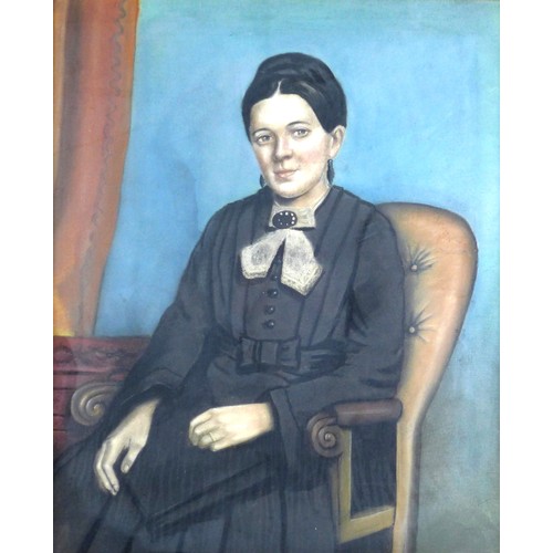 136 - British School (20th century): a half length portrait of a woman seated in a Victorian armchair, wea... 