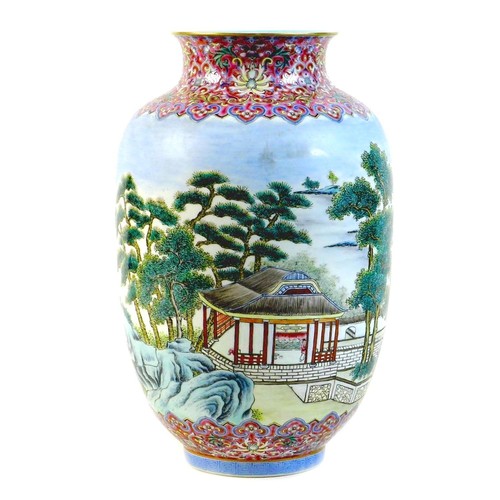 3 - A Chinese famille rose porcelain vase, mid 20th century, decorated with a continuous scene of buildi... 