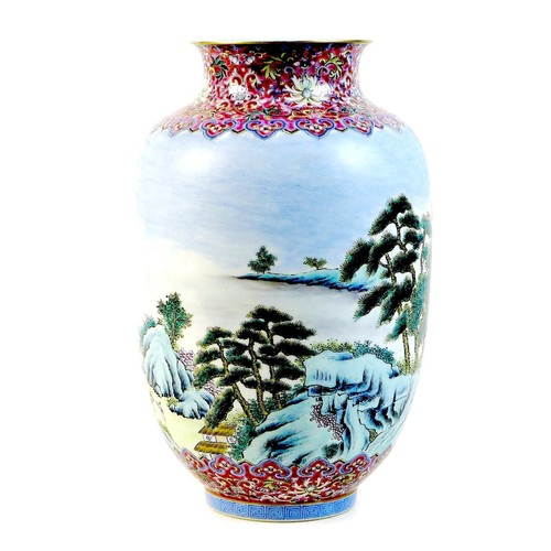 3 - A Chinese famille rose porcelain vase, mid 20th century, decorated with a continuous scene of buildi... 