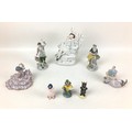 A group of English and Continental figurines, comprising a 19th century Staffordshire flatback figur... 