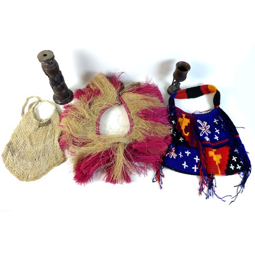 68 - A group of ethnographic and tribal items comprising an initiation skirt from the Trobriand Islands, ... 