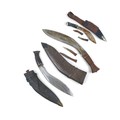 A group of three Kukris, largest measuring 34cm blade length, 44cm overall, a GMR, Number four, mark... 