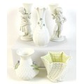 A collection of Belleek pottery, comprising Girl Basket Bearer and Boy Basket Bearer (a/f chip to ba... 