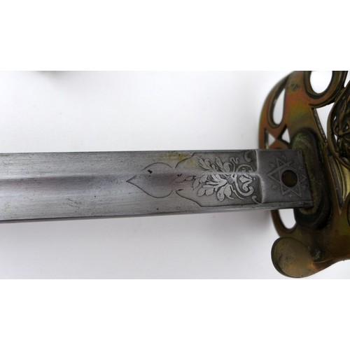 66 - A Victorian General Officers sword, with brass gothic guard with crossed sword and baton surrounded ... 