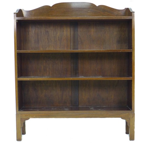 245 - An Edwardian mahogany bookcase, with shaped top, two adjustable shelves and two fixed shelves, 99 by... 