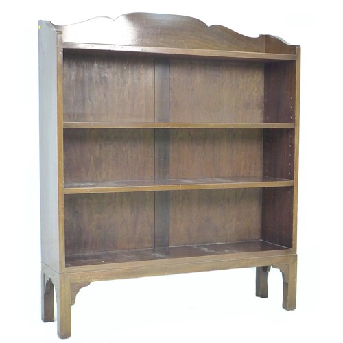 245 - An Edwardian mahogany bookcase, with shaped top, two adjustable shelves and two fixed shelves, 99 by... 