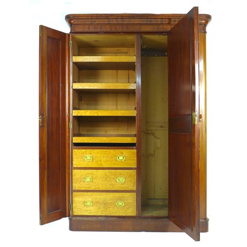 295 - A Victorian mahogany compactum wardrobe, with single mirrored door, fitted interior with drawers and... 