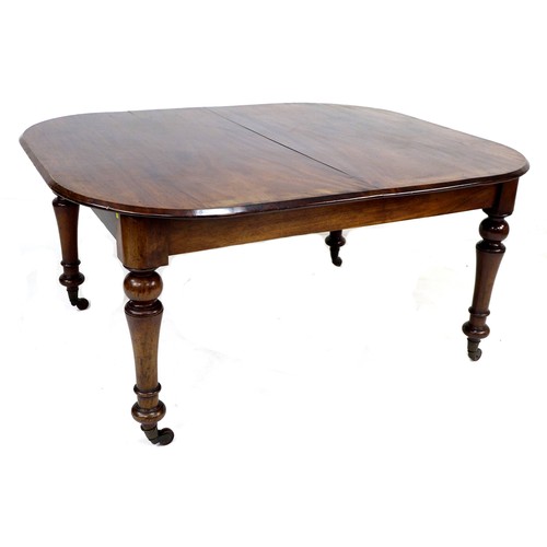 280 - An early Victorian mahogany extending dining table, rectangular surface with rounded corners and mou... 